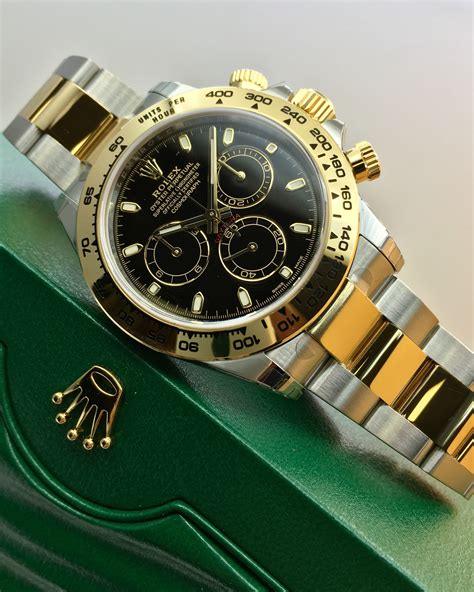 rolex gold and black daytona|Rolex daytona watch 2021.